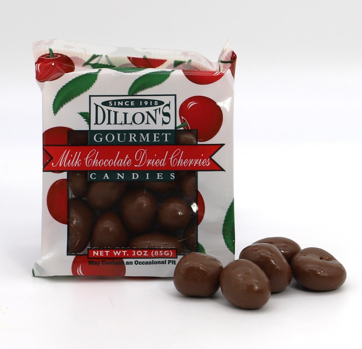 Dillon's Gourmet Milk Chocolate Dried Cherries Candies, 3oz bag with scattered chocolate cherries, premium snack packaging.