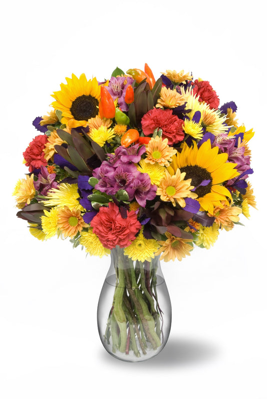 Vibrant autumn bouquet with red, orange, yellow flowers and chili peppers in a vase, featuring 35 colorful stems for fall decor.