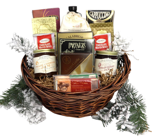 Festive breakfast gift basket with pancakes, syrups, and holiday treats for a cozy Christmas morning.