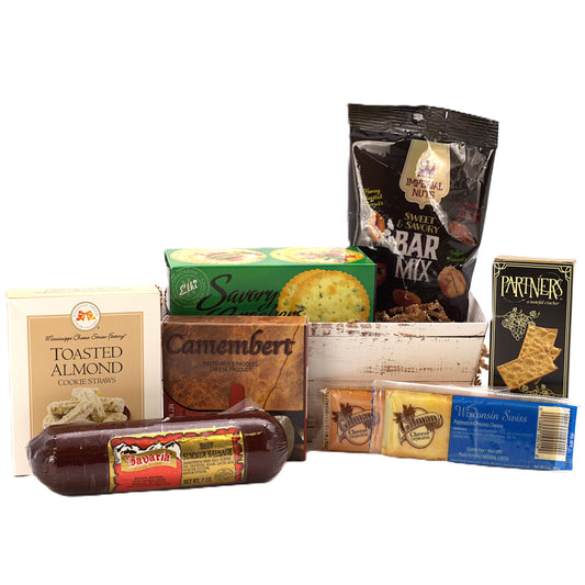 Gourmet cheese and sausage gift basket with crackers, cheese spread, and sweet treats for holidays and special occasions.