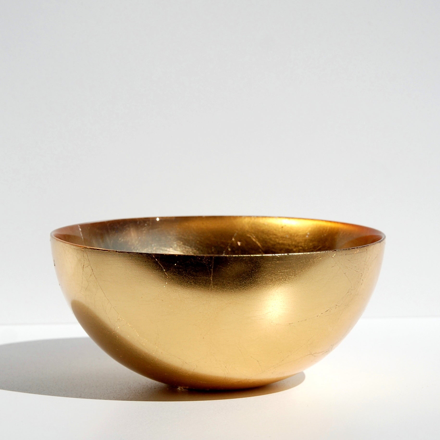 Aurion Gilded Glass Serving Bowl with gold-gilded metallic finish, 8-inch size, perfect for fruits, salads, or centerpiece displays.