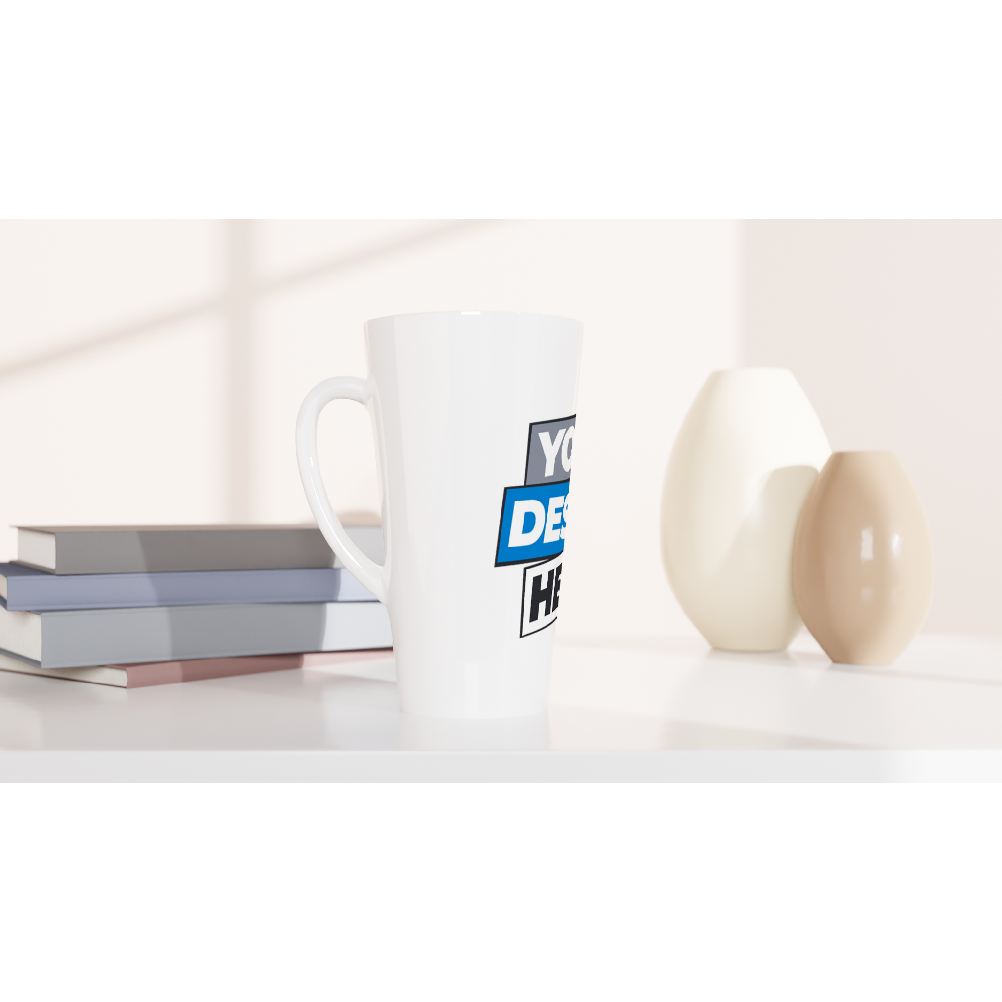 17oz white ceramic latte mug with customizable design placed on a table with books and decorative vases; perfect for coffee or latte.