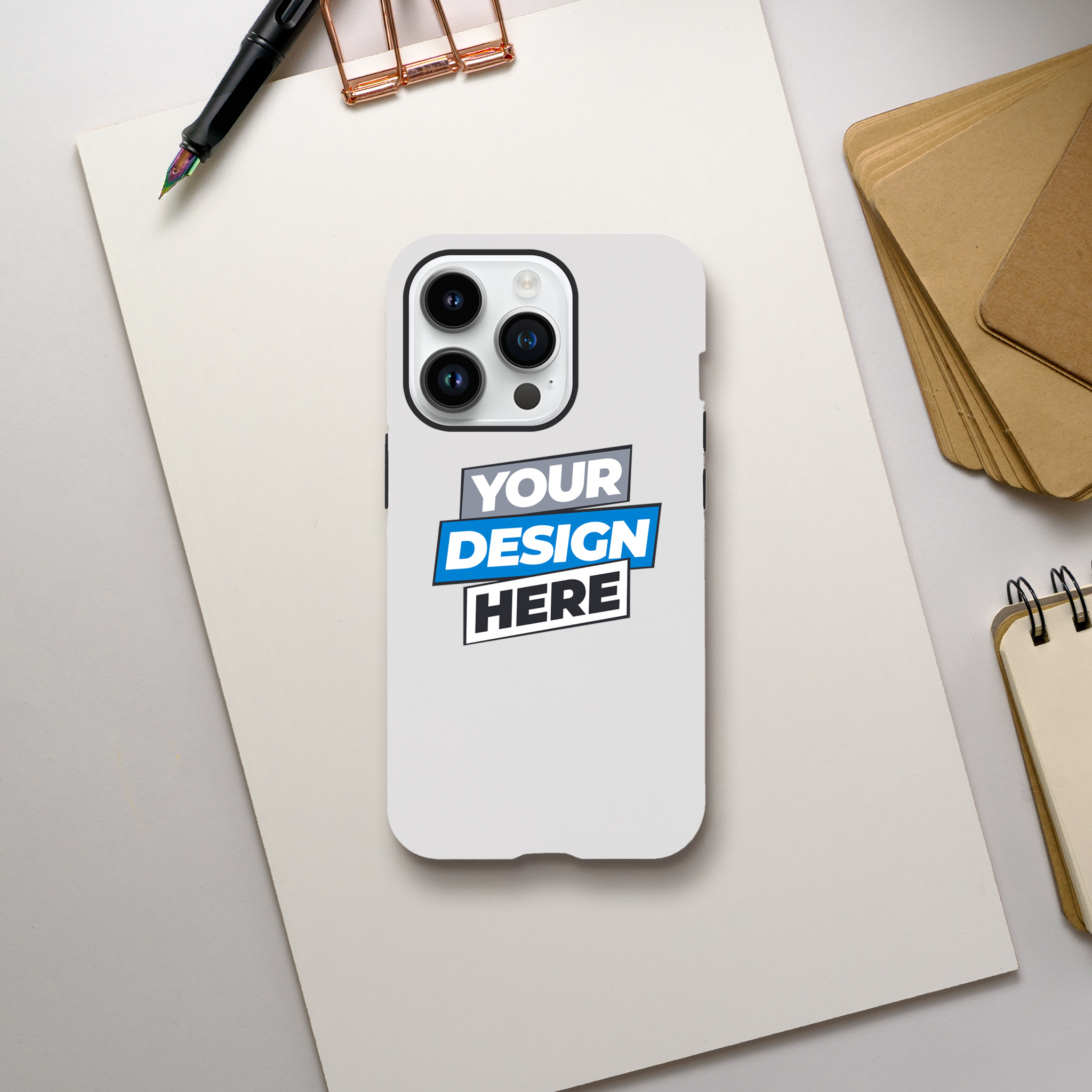 Customizable gloss tough case for iPhone with dual-layer protection, featuring a 'Your Design Here' template on a notepad background.