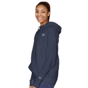 Person wearing Elmoré Premium Pullover Hoodie, showcasing kangaroo pocket and three-panel hood with tonal drawcords.