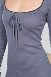 Orlissa Pointelle Mini Dress with long fitted sleeves and scalloped square neckline in soft grey knit with faux drawstring detail.