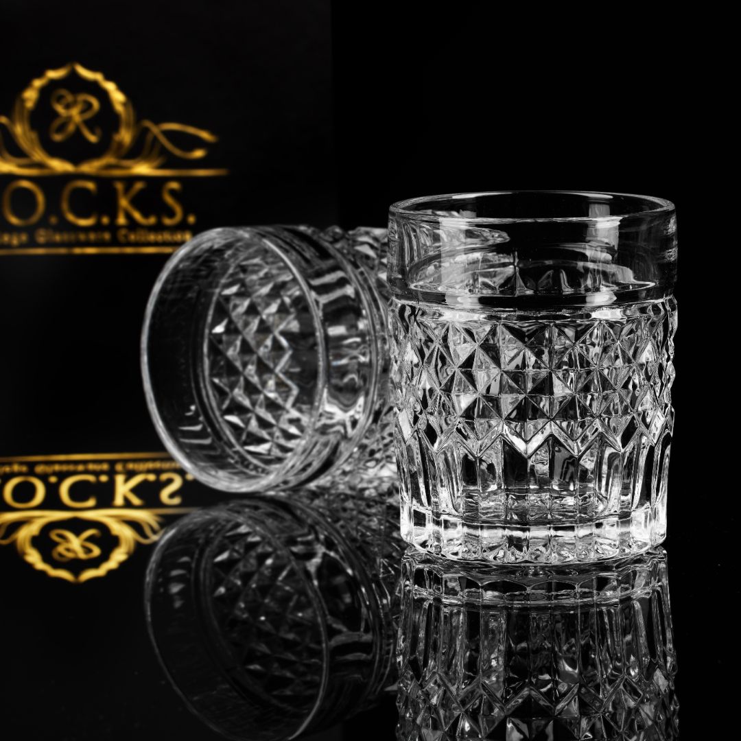 Prestige Whiskey Crystal Set showcasing elegant, diamond-cut crystal whiskey glasses from Privilege Collection reflecting luxury.
