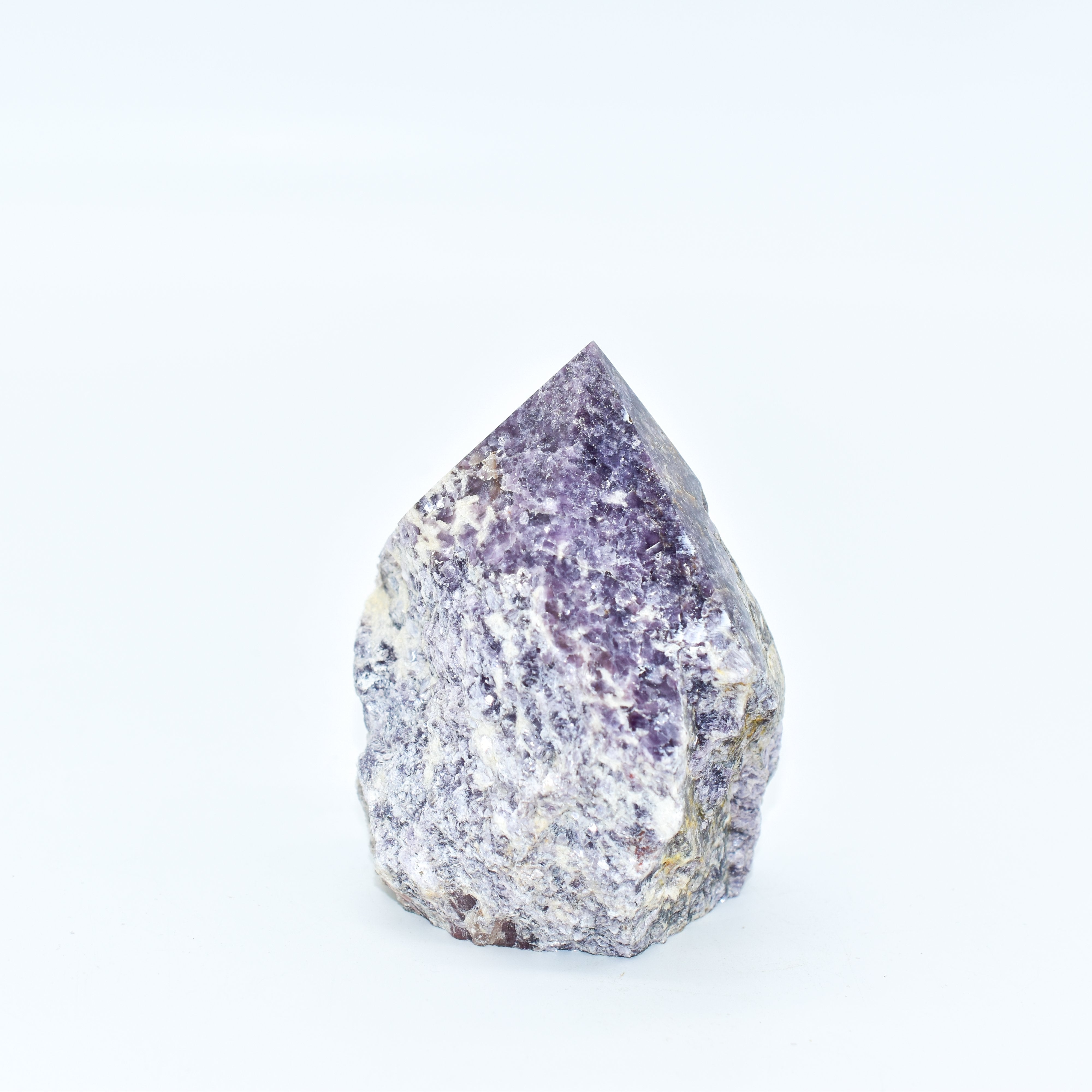Soothing Lepidolite Power Point with polished peak and natural base, ideal for stress relief and mindful rituals.