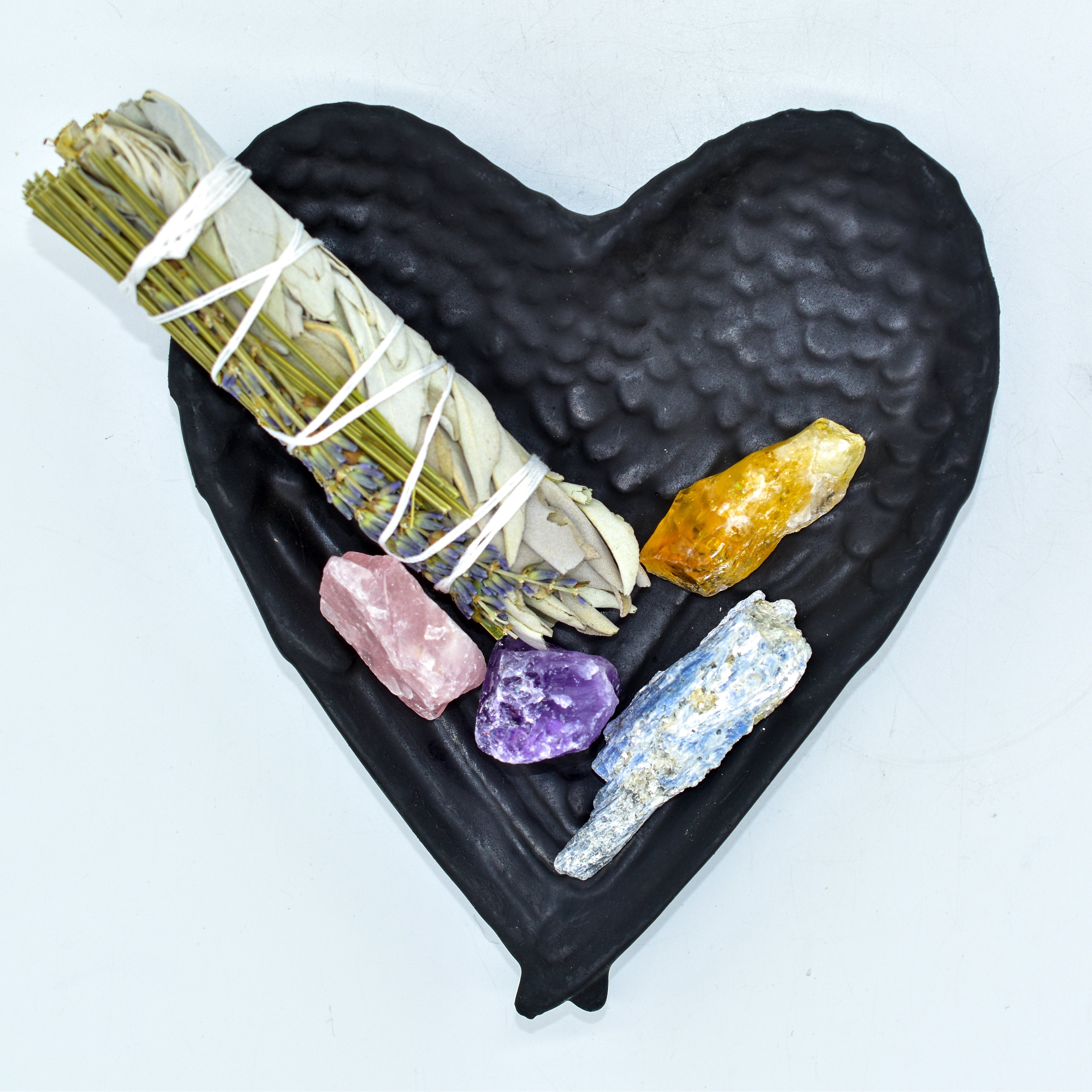 Shungite Heart Wings Display Dish with small crystals and sage bundle, protects from EMF radiation while offering grounding energy.