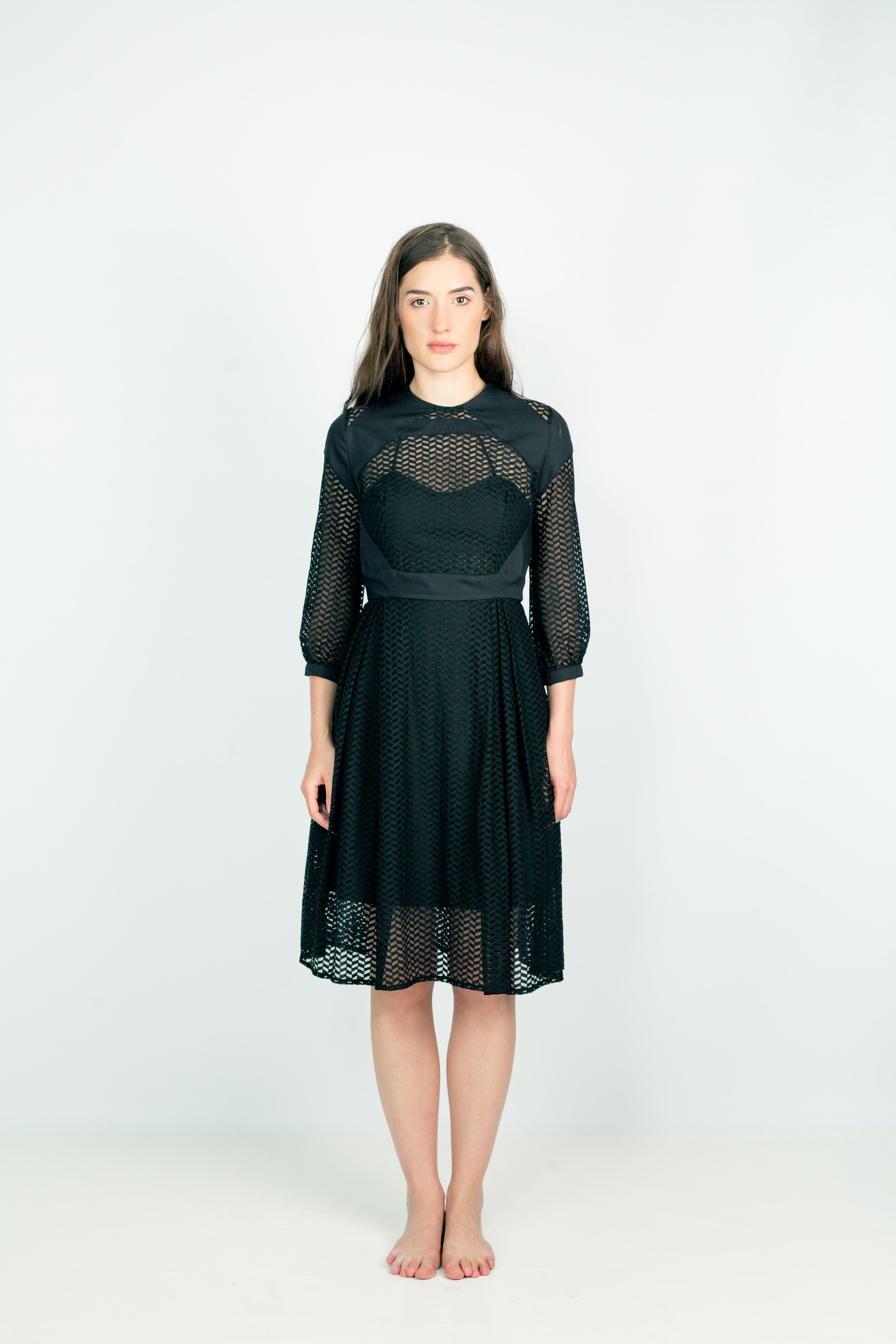 Model wearing Lixell Mesh-Panel Dress with airy polyamide mesh panels and covered button neckline, showcasing elegant transparency and style.