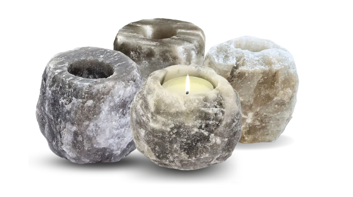 Himalayan salt crystal candle holders with unique textures emitting a soft glow, perfect for meditation or relaxation spaces.