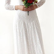 Elverin Medieval Lace Wedding Dress with off-shoulder neckline and romantic sleeves, held with a bouquet for vintage bridal style.