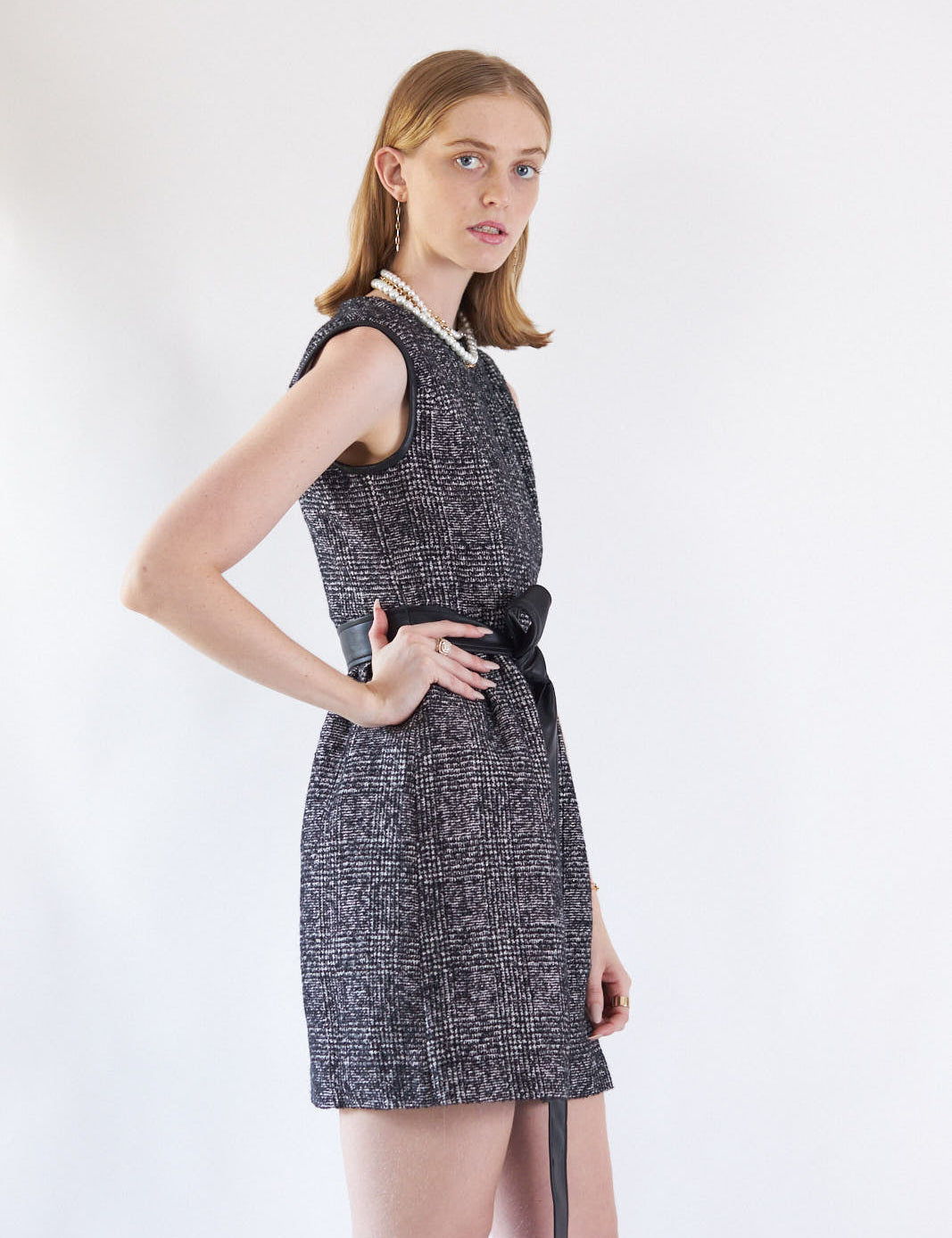 Model wearing Clarette Wool-Blend Tweed Dress, showcasing tailored fit and elegant silhouette for business or social events.