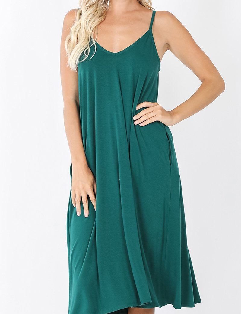 Maribel V-Neck Swing Dress with cami straps in teal, knee-length, featuring a relaxed, billowy shape and on-seam pockets.