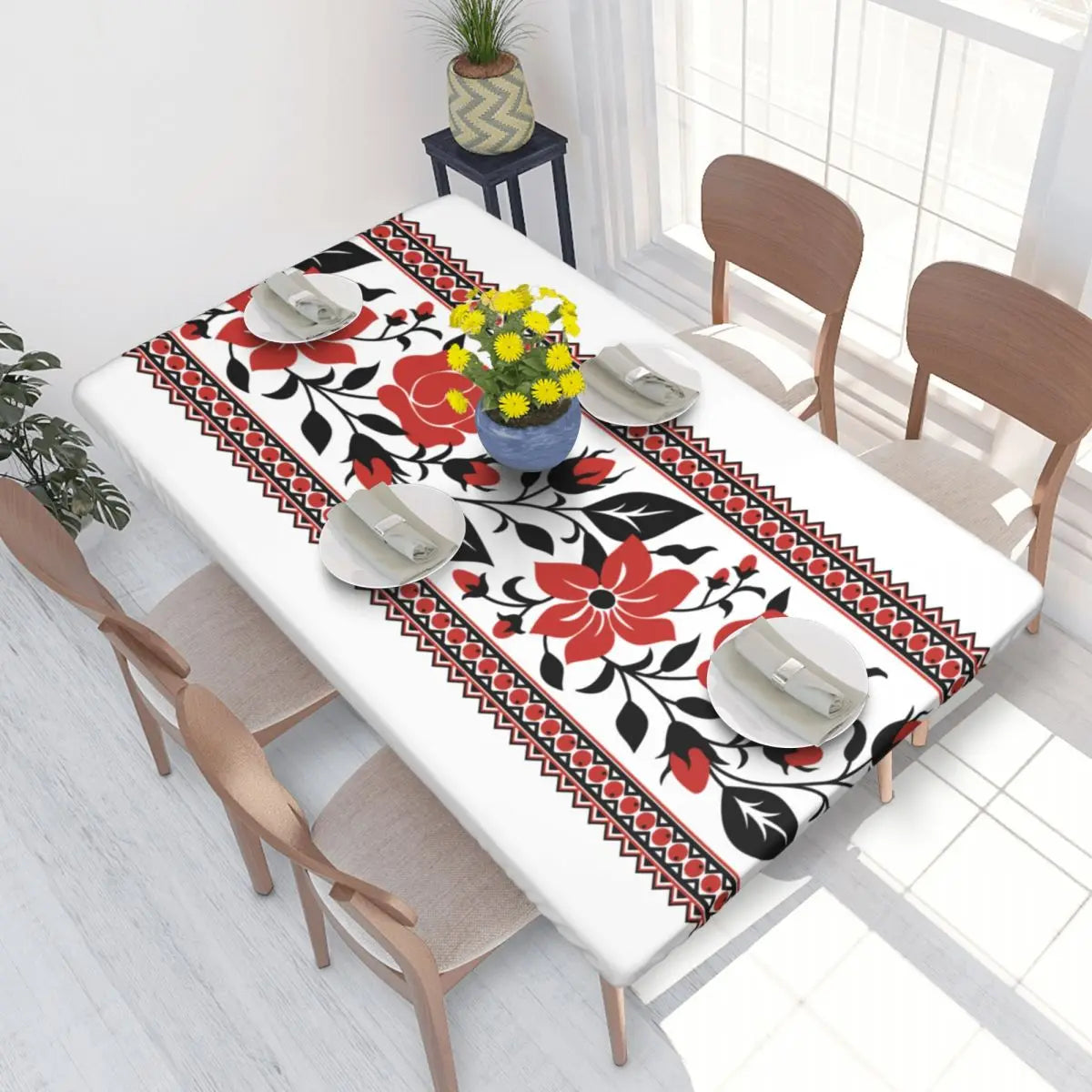 Authentic Ukrainian embroidery table cover with floral design on dining table, enhancing decor with vibrant colors and premium fabric.