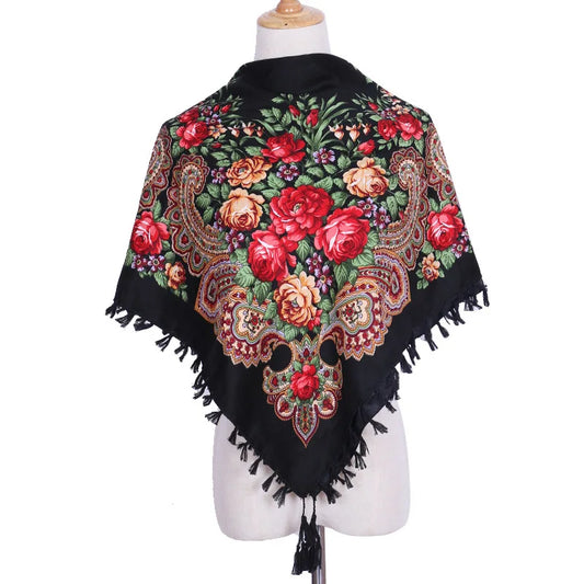 Vintage Ukrainian embroidered headscarf with floral design displayed on a mannequin.