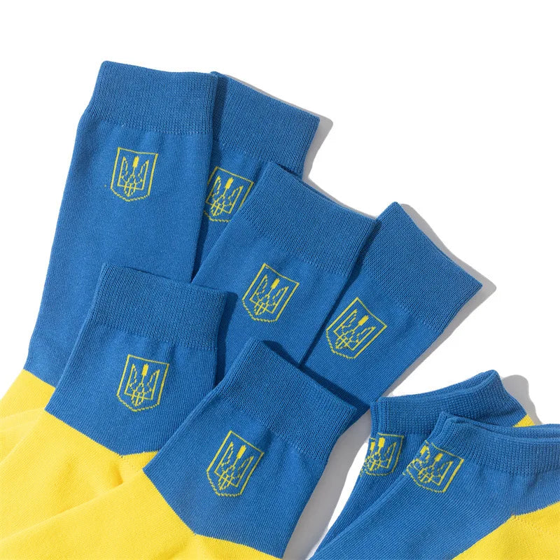 Blue and yellow socks with Ukrainian flag emblem, symbolizing national pride and patriotism.