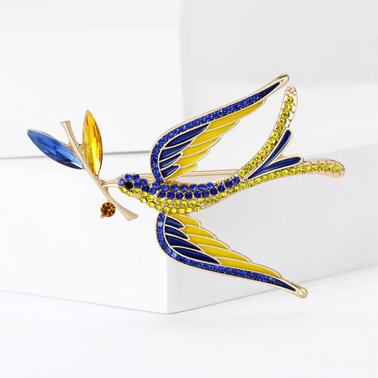 Ukrainian Peace Martlet Brooch with blue and yellow details, symbolizing hope and unity, handcrafted for a unique look.