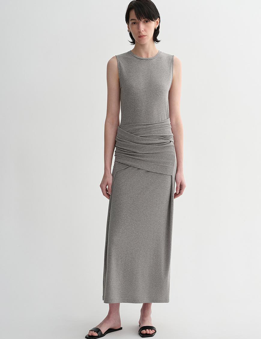 Urban Sculpt wool blend midi dress with minimalist design, round neckline, and tailored armholes, shown on a standing model.