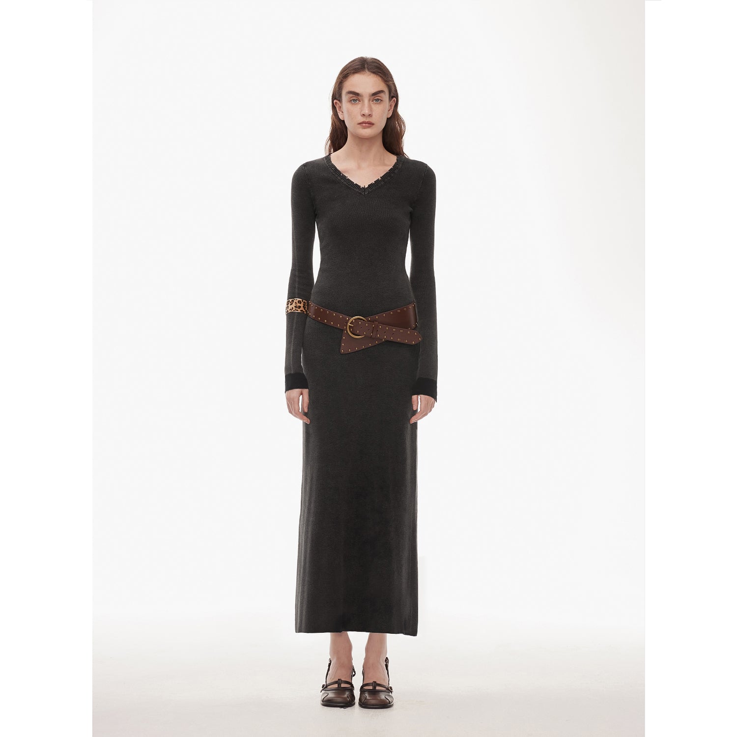Selvara Distressed Cotton V-Neck Dress with raw-cut neckline, hand-trimmed edges, and contrast cuffs, model standing forward.