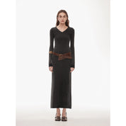 Selvara Distressed Cotton V-Neck Dress with raw-cut neckline, hand-trimmed edges, and contrast cuffs, model standing forward.
