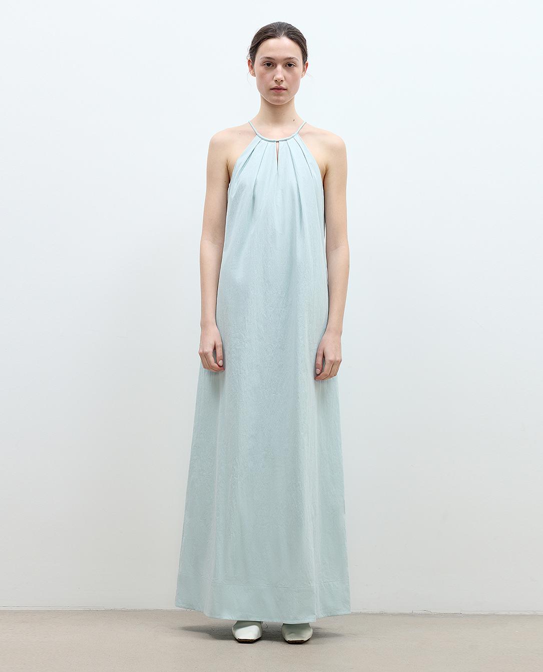 Light blue Veridia Halter-Pleat Maxi Dress with cotton-rope halter and pleated neckline, offering relaxed volume and elegant ankle-length design.
