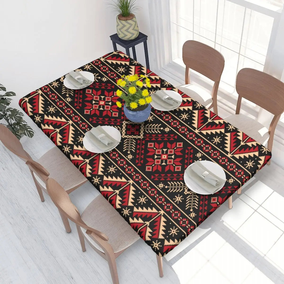 Authentic Ukrainian embroidery table cover on dining table with colorful geometric patterns.