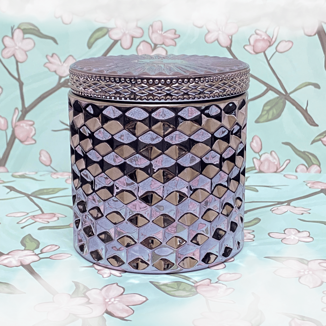 Elegant diamond-patterned candle jar with floral background, ideal for home decor and ambiance.
