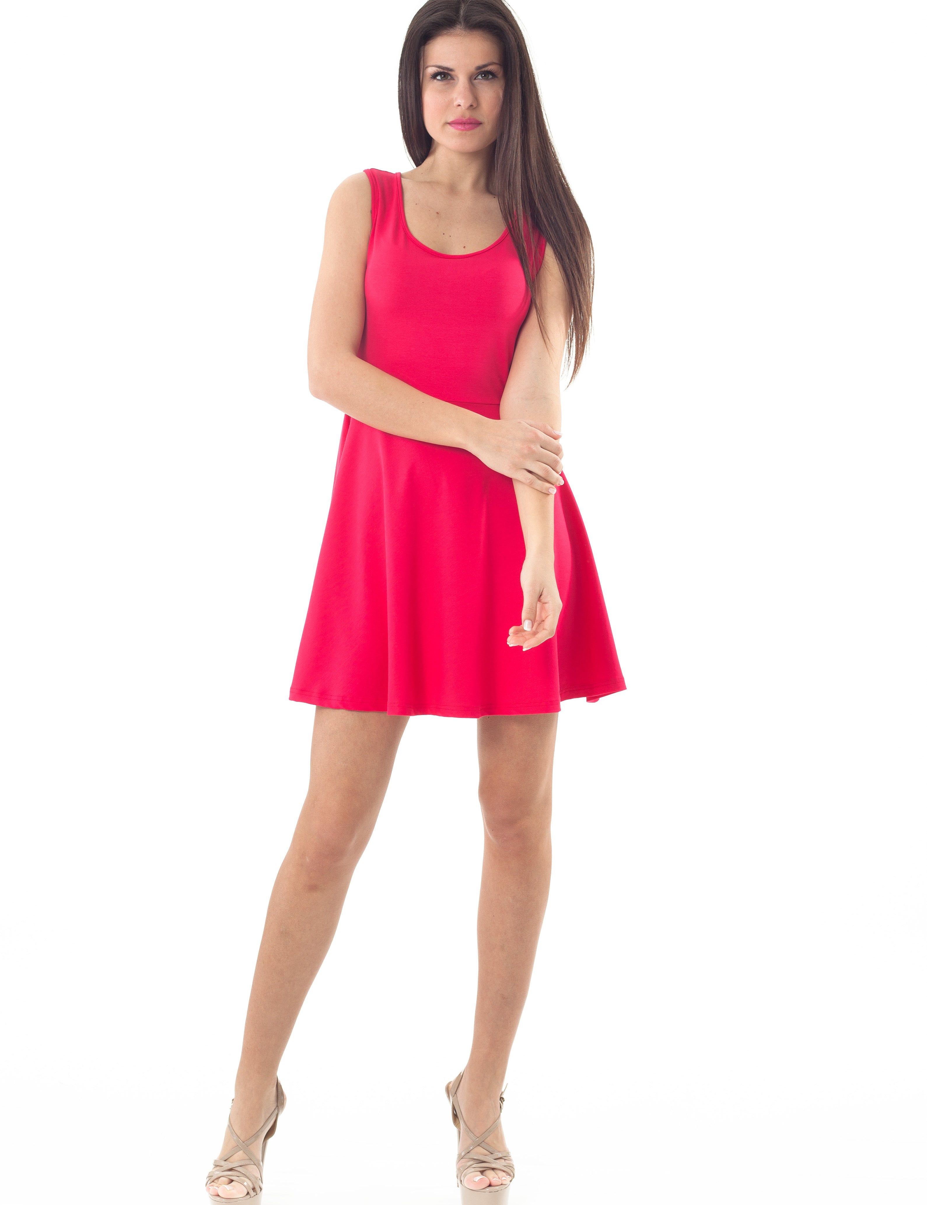 Woman wearing Sorina Bow-Back Skater Dress in vibrant red stretch jersey with a flared skirt and open back design.