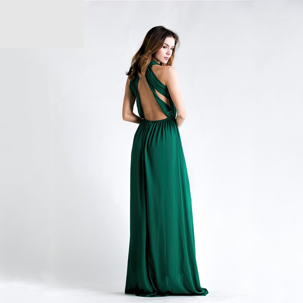 Emeralda Deep V-Back Gown in lush green, featuring a sleeveless design, open back, and flowing silhouette for elegant occasions.