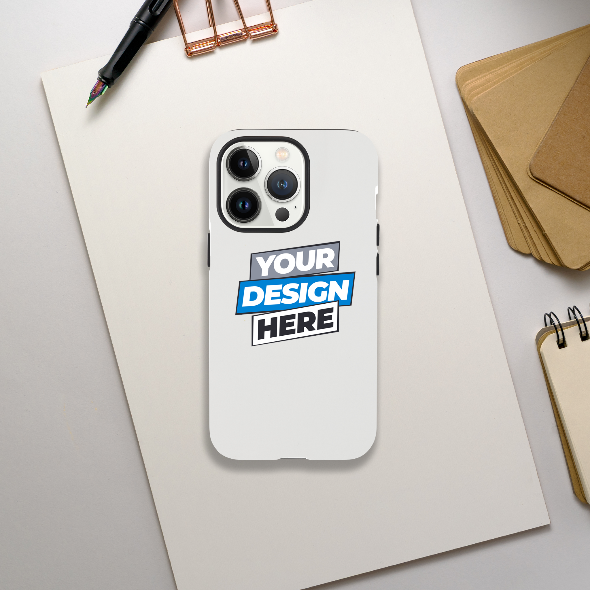 Print on Demand Gloss Tough iPhone Case with customizable design, showcasing dual-layer protection and glossy finish on a desk.