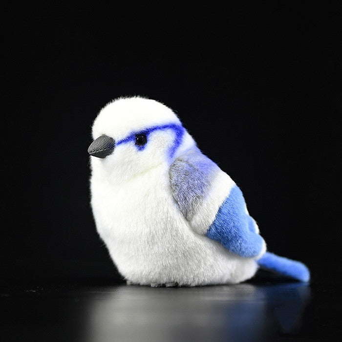 Gray blue tit plush toy in soft fabric, small bird stuffed animal.