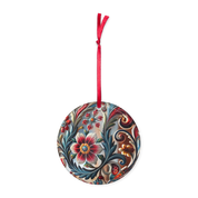 Ukrainian style circle acrylic ornament with floral design and red ribbon