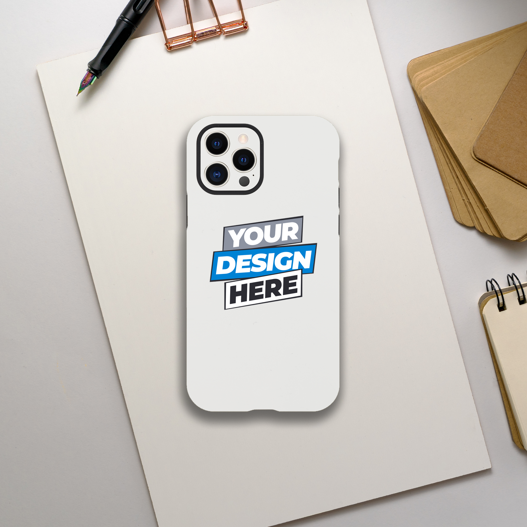Print on Demand Gloss Tough iPhone Case with customizable design on a desk with stationery.