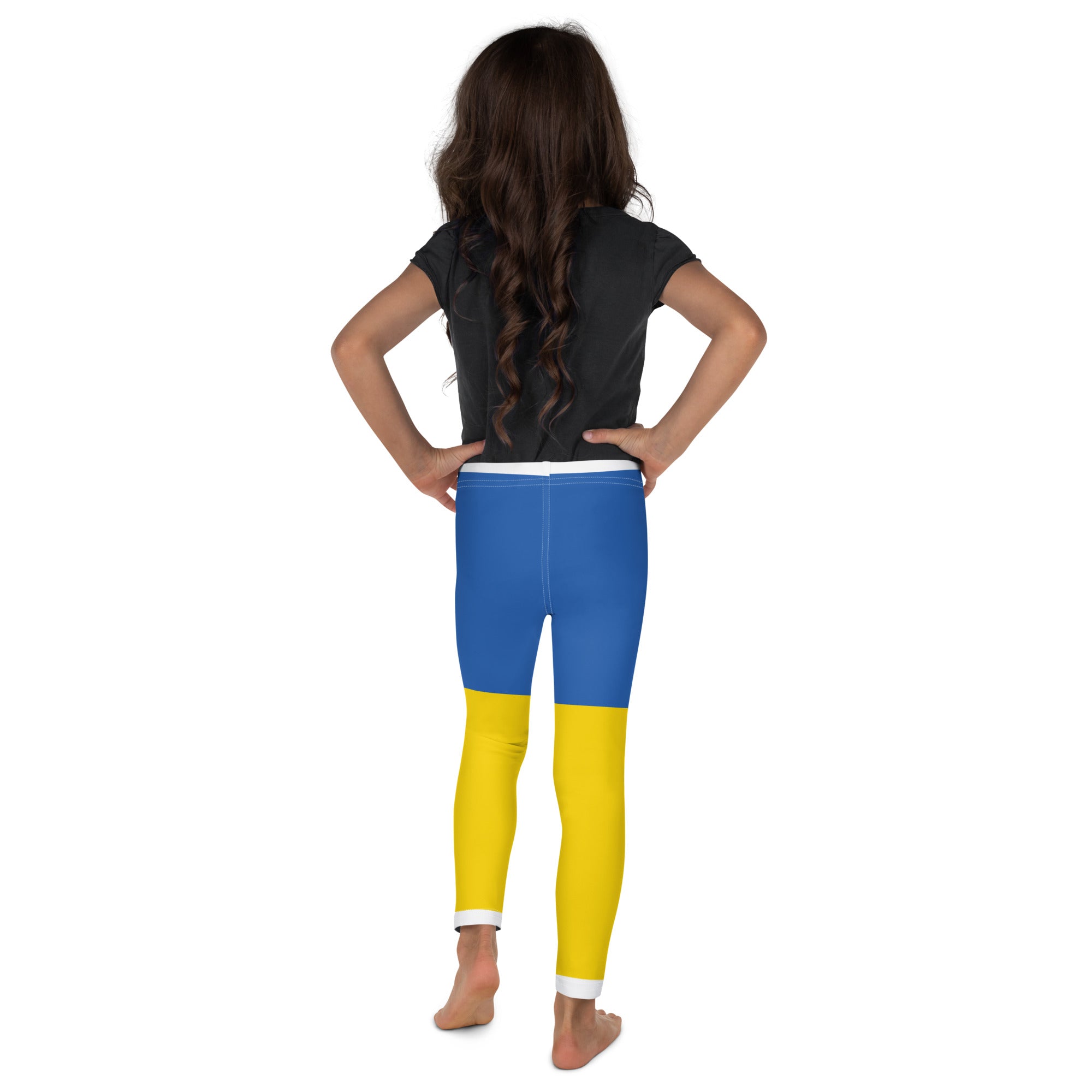 Child wearing leggings with Ukrainian flag design, blue and yellow colors, showcasing soft and stretchy fabric for comfortable fit.