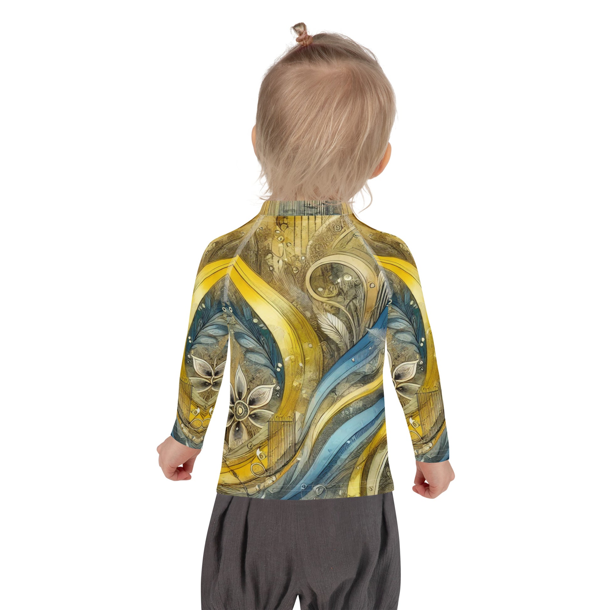 Toddler wearing a vibrant Ukrainian abstract design kids rash guard with long sleeves, ideal for sun protection and outdoor play.