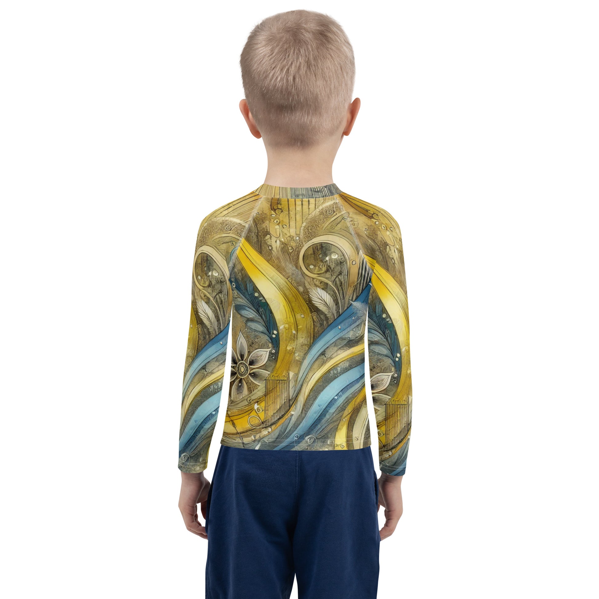 Child wearing a kids rash guard with Ukrainian abstract design, showcasing vibrant yellow and blue patterns, UPF 50+ sun protection.