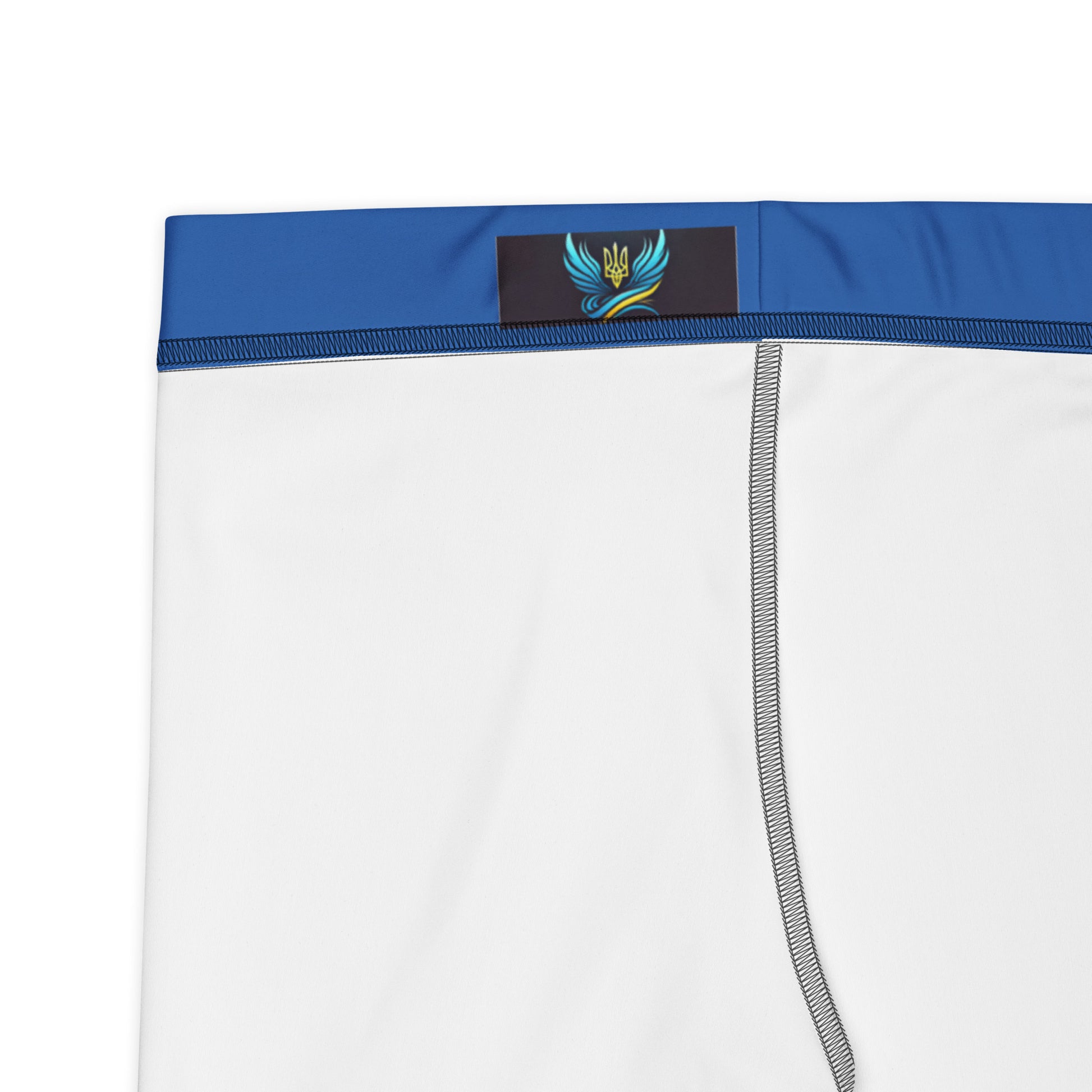 Ukrainian flag shorts with blue waistband and Trizub logo from Ukrainian Vibe Collection, showcasing stretchy microfiber fabric.