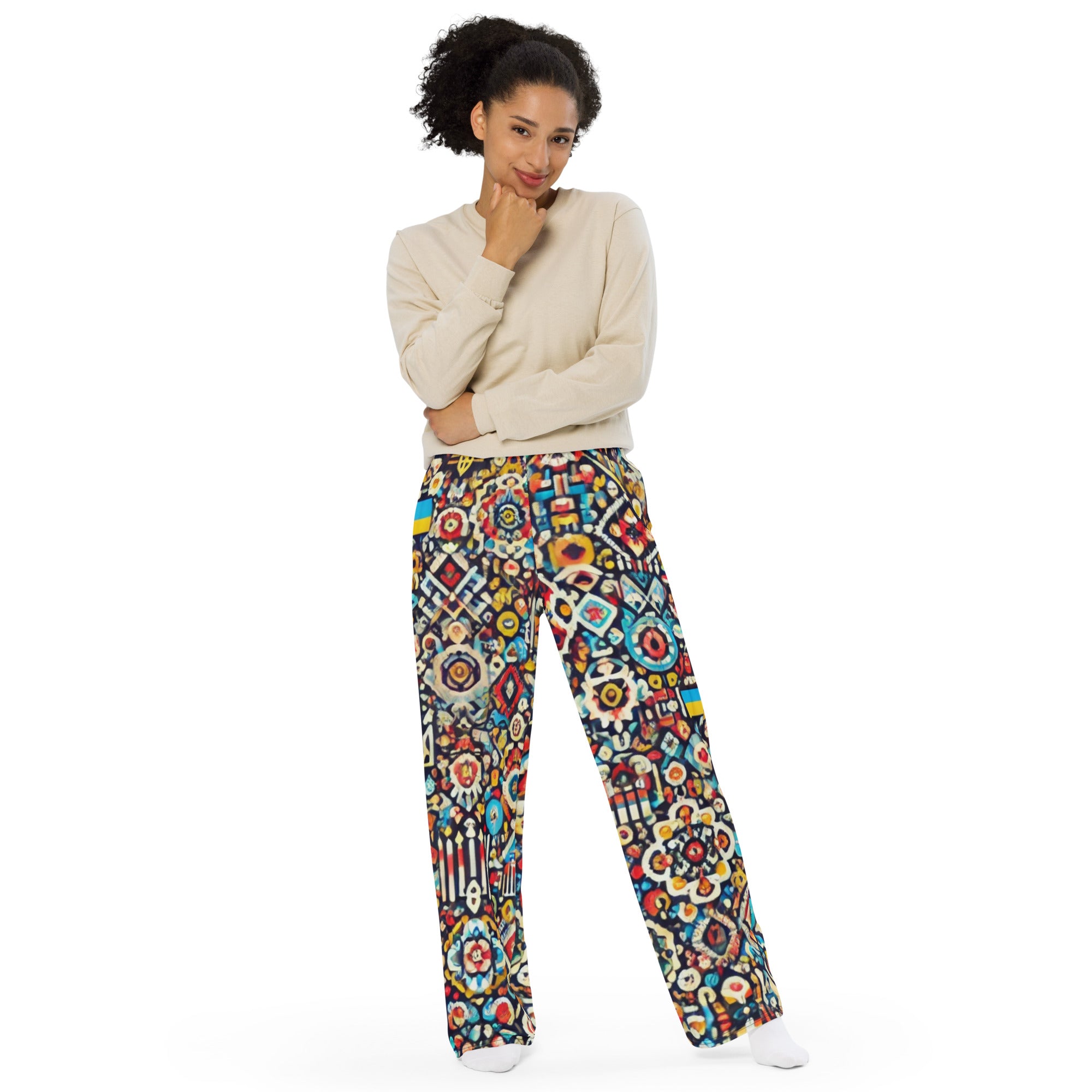 Woman wearing Ukrainian symbols wide-leg pants from the Trizub Collection, featuring vibrant patterns and a comfortable, stylish fit.