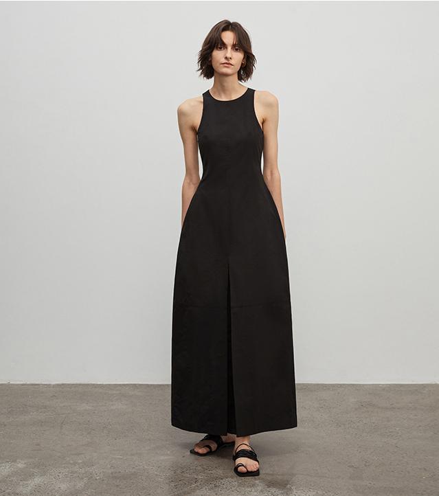 Arclaire sleeveless A-line dress in black, showcasing a minimalist design with a flattering fit, perfect for effortless elegance.