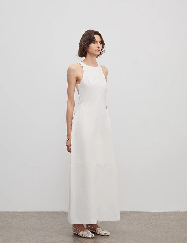 Arclaire Sleeveless A-Line Dress featuring minimalist French elegance in white, perfect for effortless movement and sculpted style.