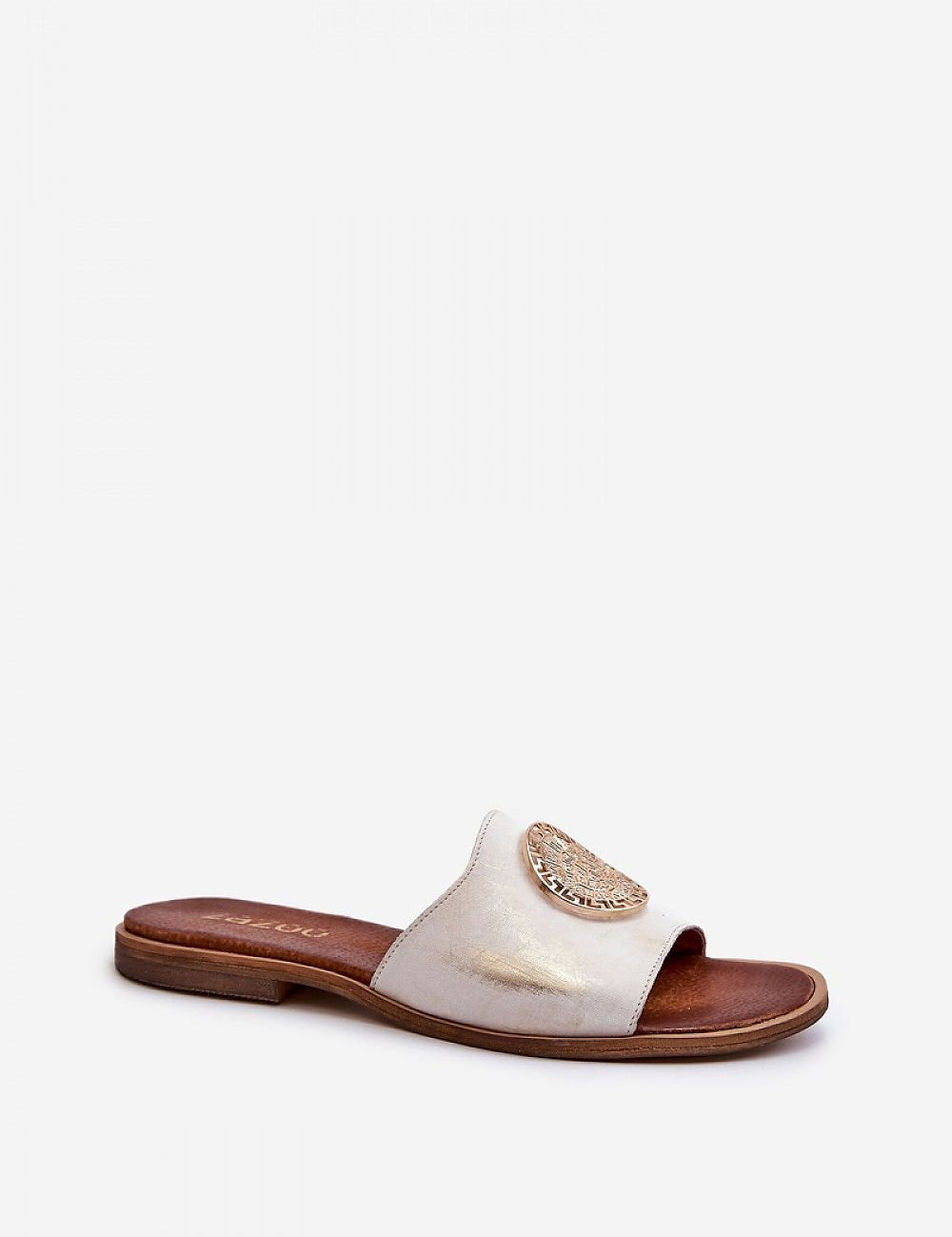 Ardelle gold accent leather flip flops with flat heel and decorative gold embellishment on straps, perfect for elegant summer wear.
