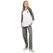 Woman wearing Mervelle Raglan Sleeve Tee with contrasting 3/4 sleeves, soft cotton blend, and a casual fit, perfect for everyday wear.