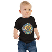 Baby wearing black jersey tee with colorful Ukrainian symbol design, made from soft combed cotton for comfort and style.