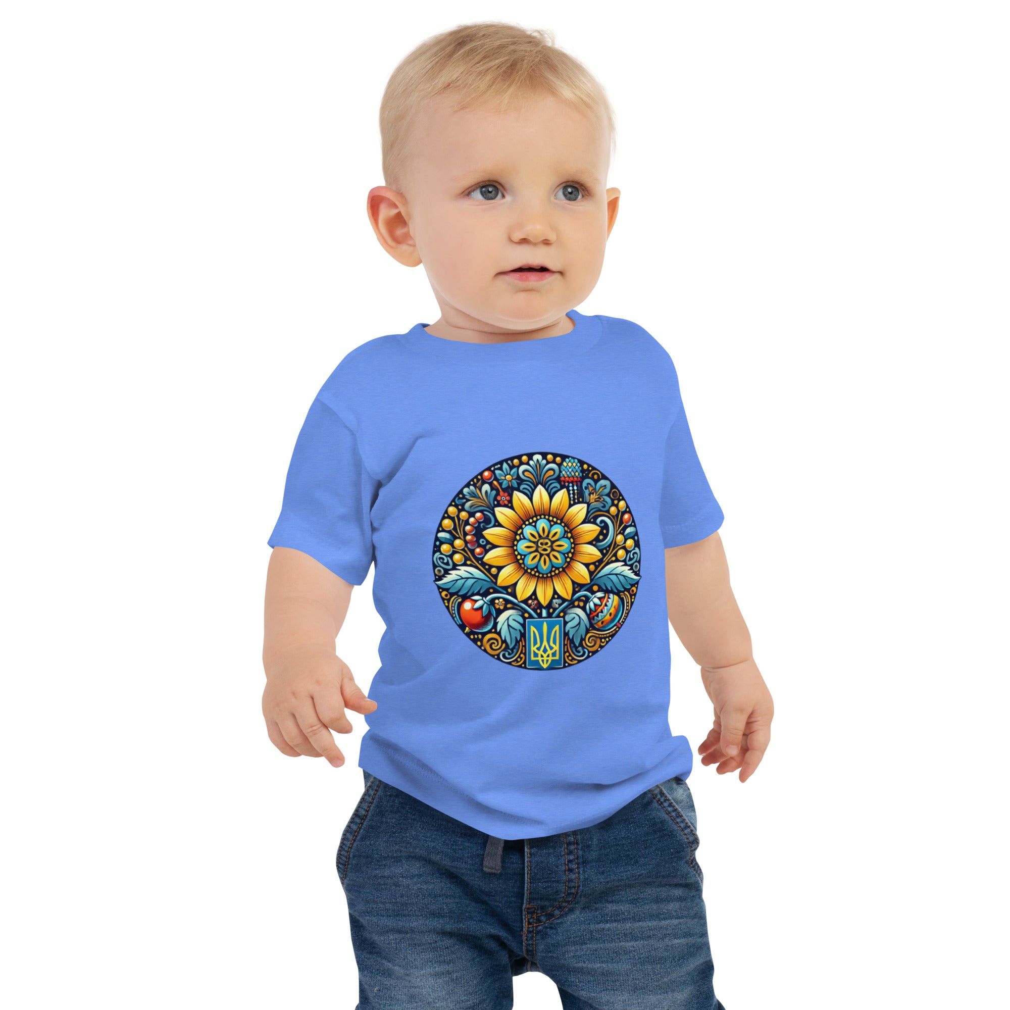 Baby wearing blue jersey tee with Ukrainian symbol design, 100% combed cotton for comfort and style.