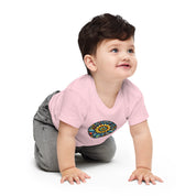 Baby wearing pink short sleeve tee with Ukrainian symbol, made from soft cotton for everyday comfort.