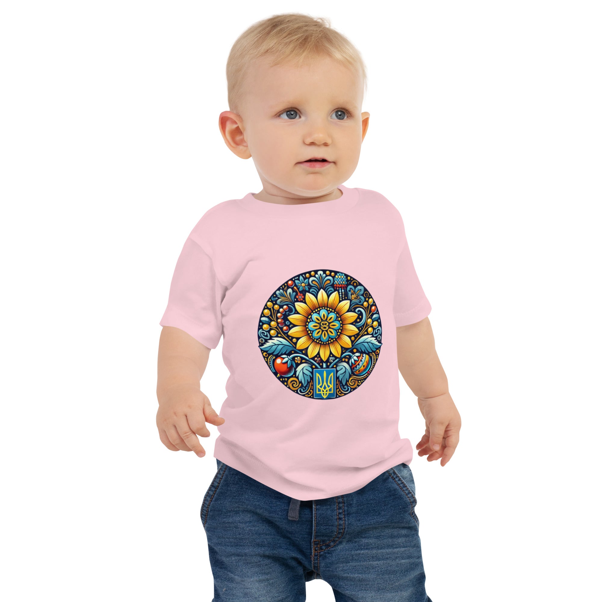Baby wearing pink jersey tee with Ukrainian symbol design, made of soft cotton for comfort and durability.