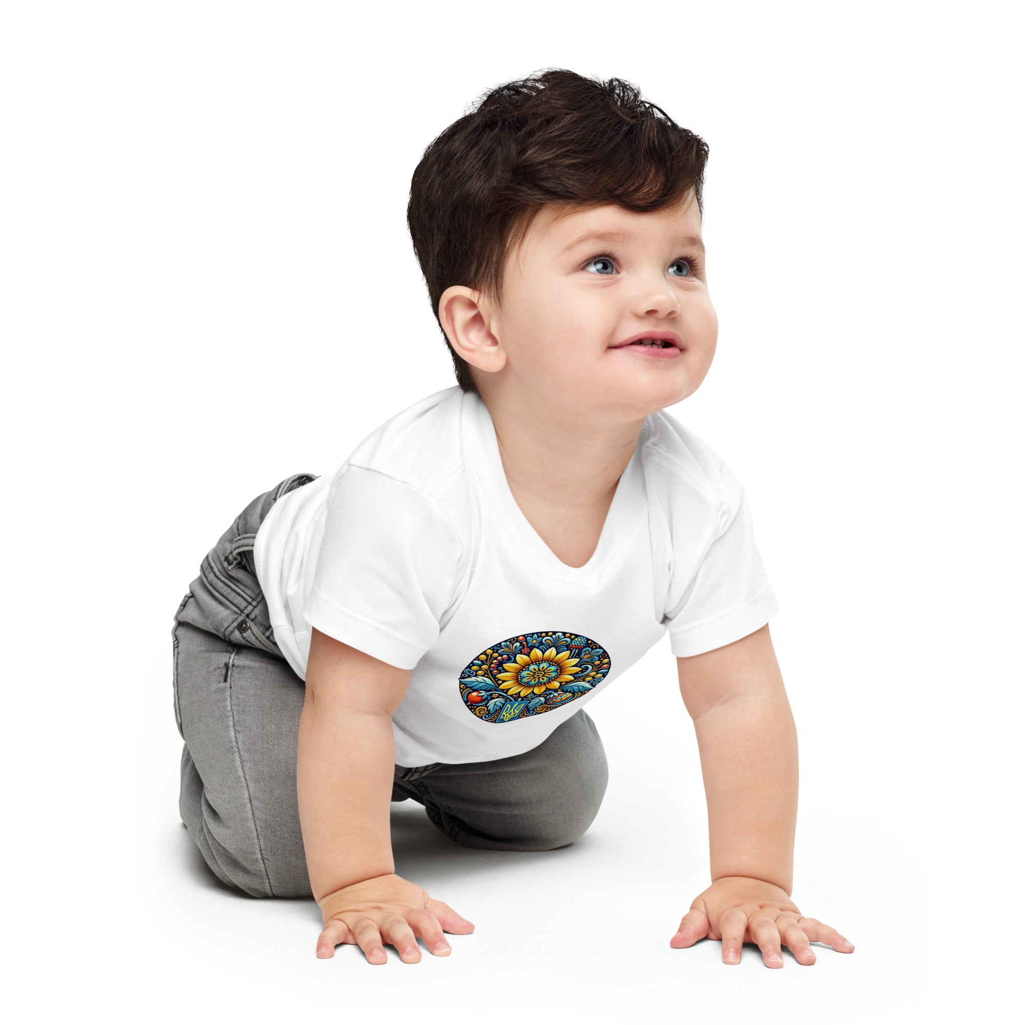 Baby wearing white short sleeve tee with Ukrainian symbol, made from soft cotton for comfort and durability. Perfect for stylish everyday wear.