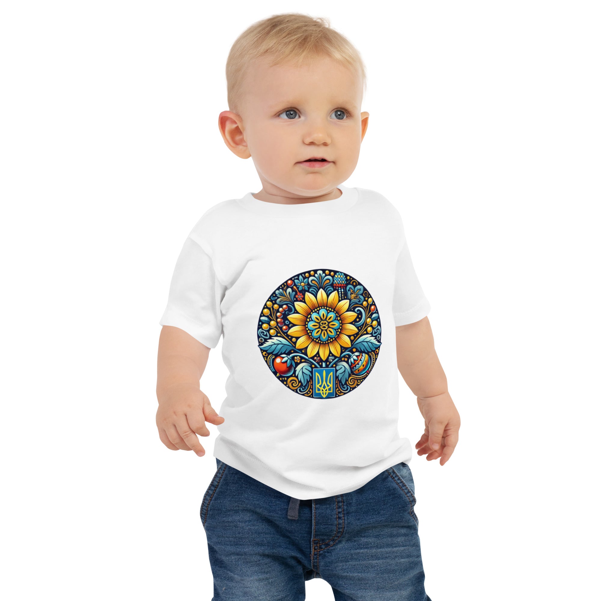 Baby wearing a white jersey tee with colorful Ukrainian symbol design, featuring a floral pattern, perfect for comfort and everyday wear.