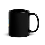 Black ceramic mug with Ukrainian Tryzub emblem, glossy finish, perfect for coffee or tea, 11oz and 15oz sizes available.