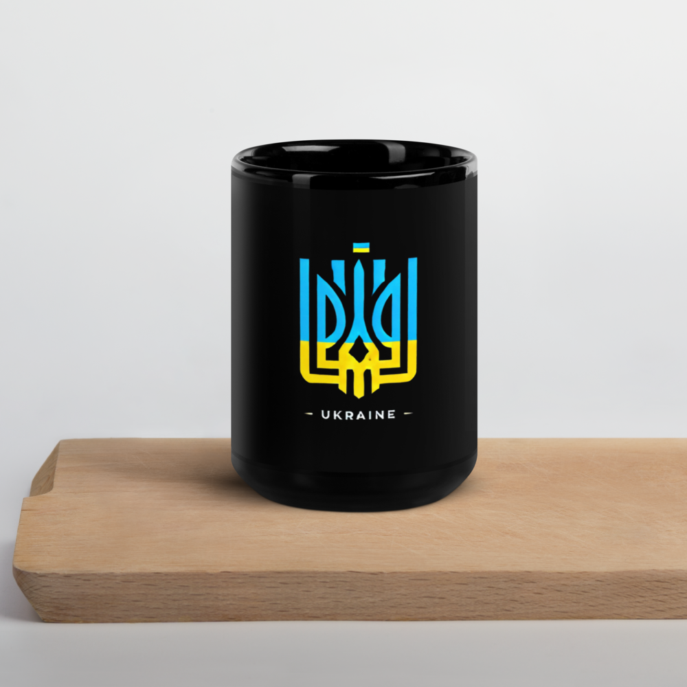 Black ceramic mug with Ukrainian Tryzub emblem, glossy finish, on wooden surface, perfect for hot beverages.